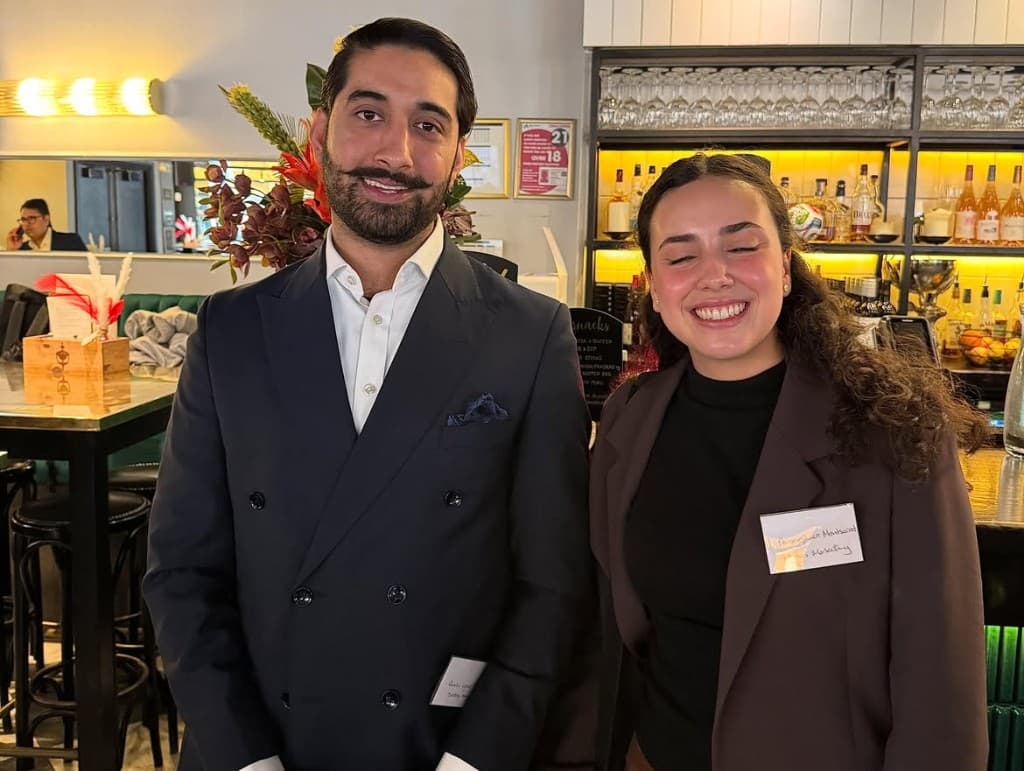Team representatives at an immigration networking evening