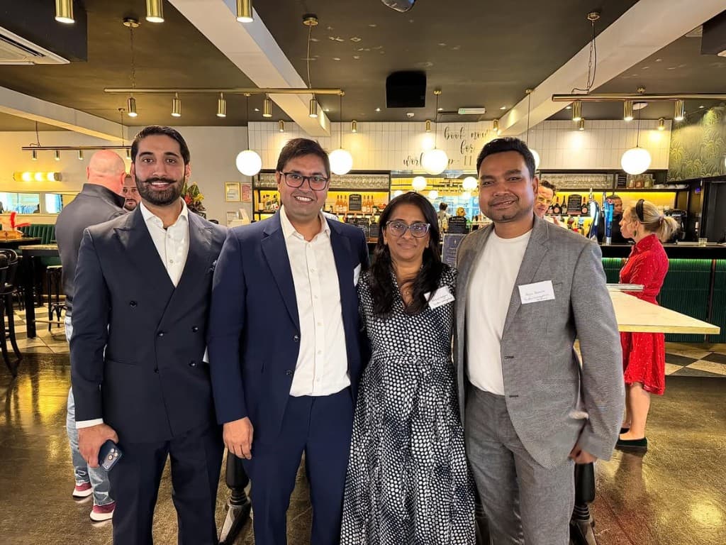 Sindhu Immigration Services team at an immigration networking event